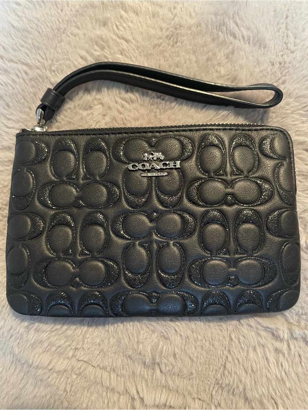 COACH Black Embossed Signature Leather Wristlet with Silver Logo